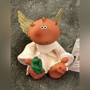 Angel Cheeks 2001 Angel with frog.